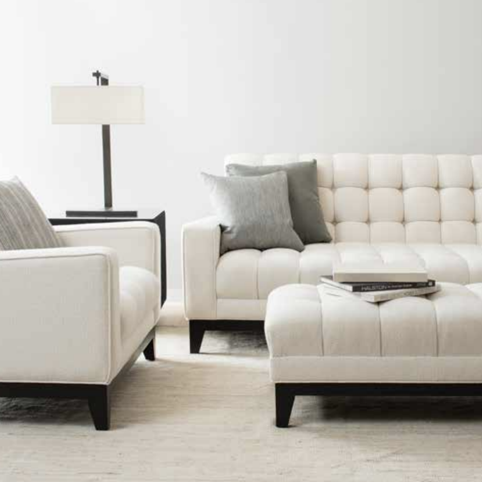 Image of Avery Boardman white tufted sofa and ottoman