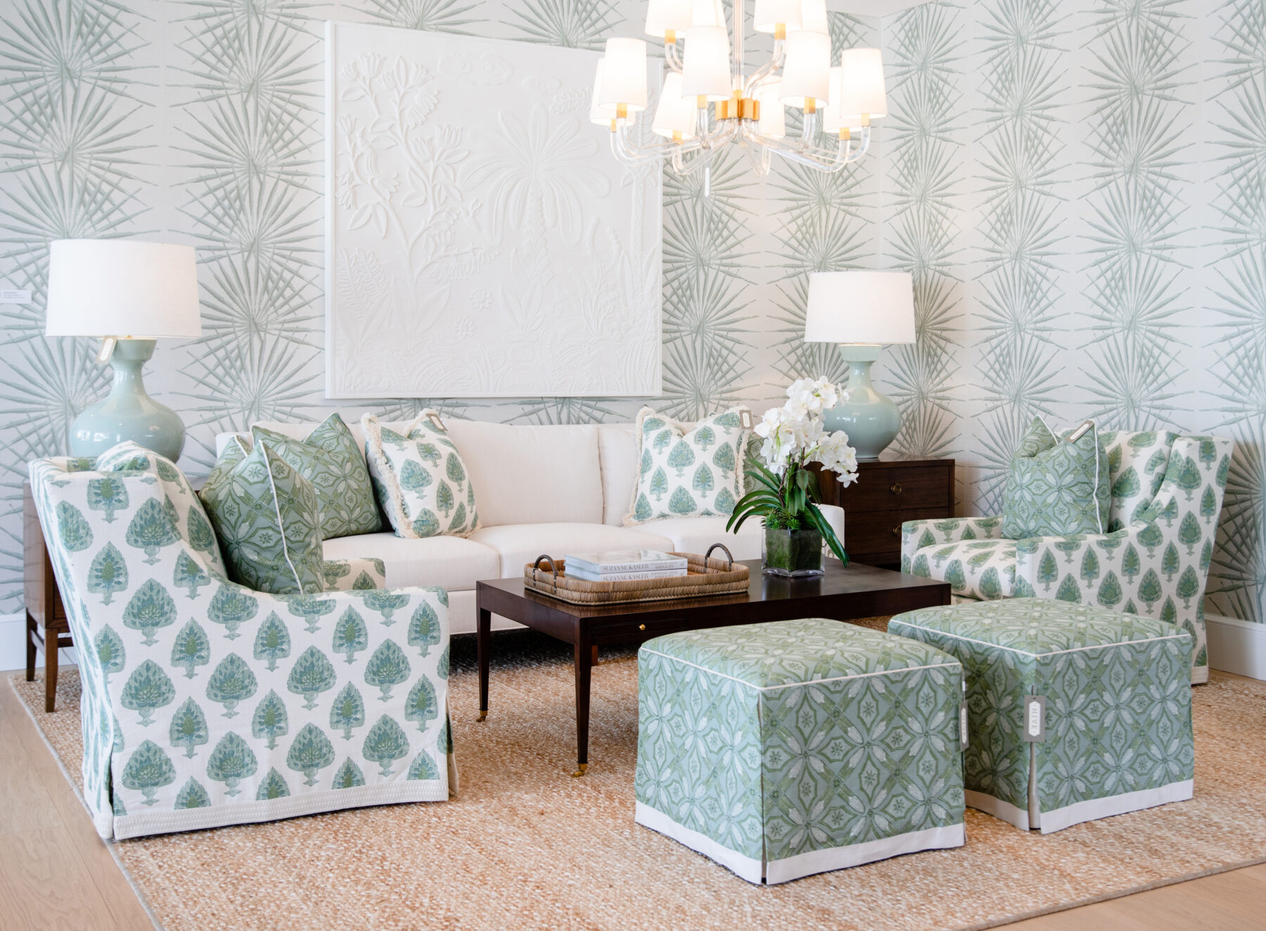 Grouping of HIckory Chair living room furniture with seafoam and white accents and Palm Orleans wallpaper