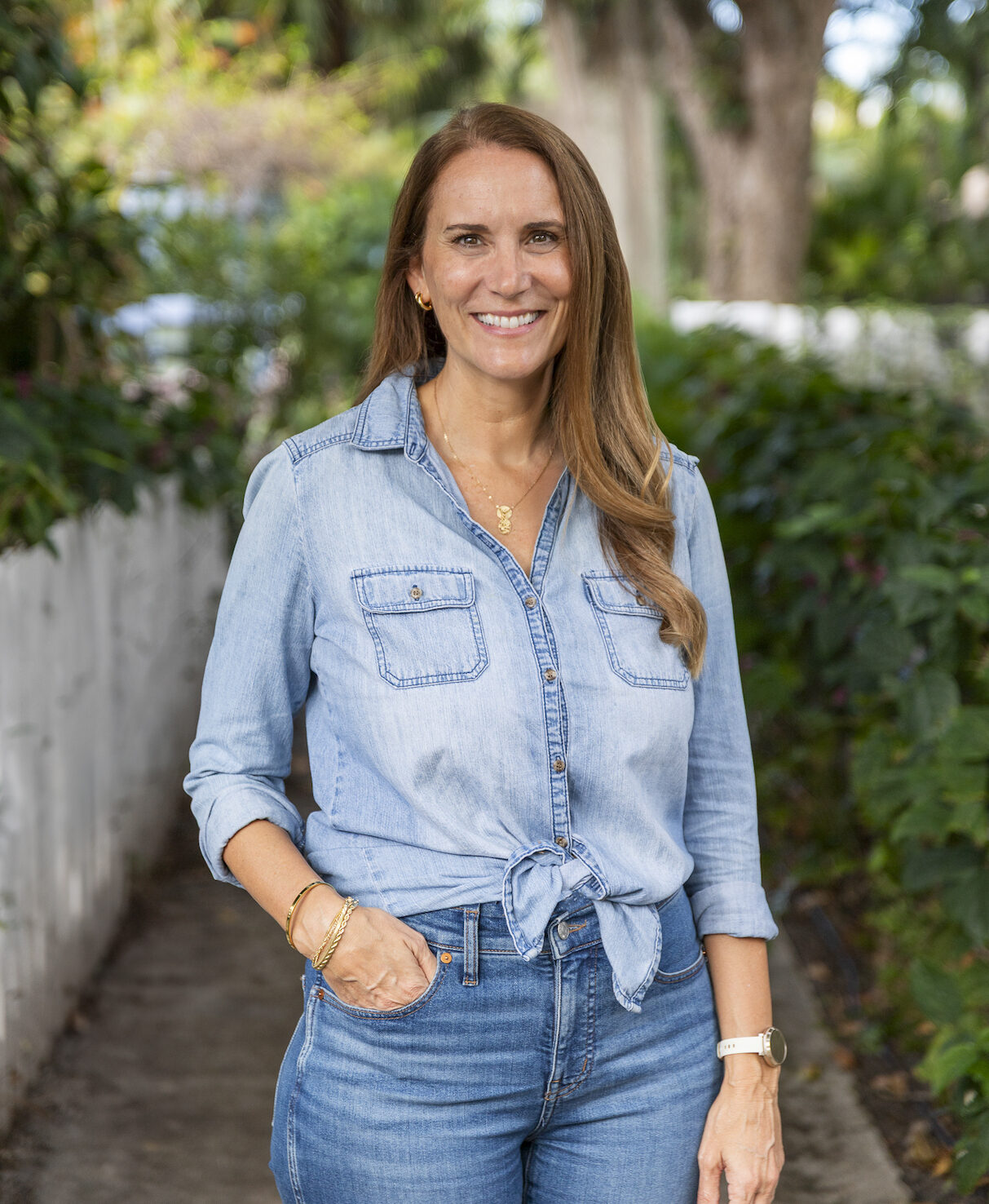 Photo of Hive trade employee in blue shirt standing outside